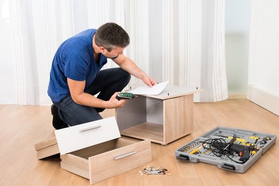 Furniture assembly with power tools (Assembly services) by Affordable Moving Solutions of Ohio
