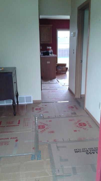 Floor protection laid down in a home entryway (Full Service Moving) by Affordable Moving Solutions of Ohio
