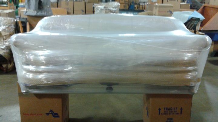 Furniture shrink-wrapped and padded for a move (Full Service Moving) by Affordable Moving Solutions of Ohio
