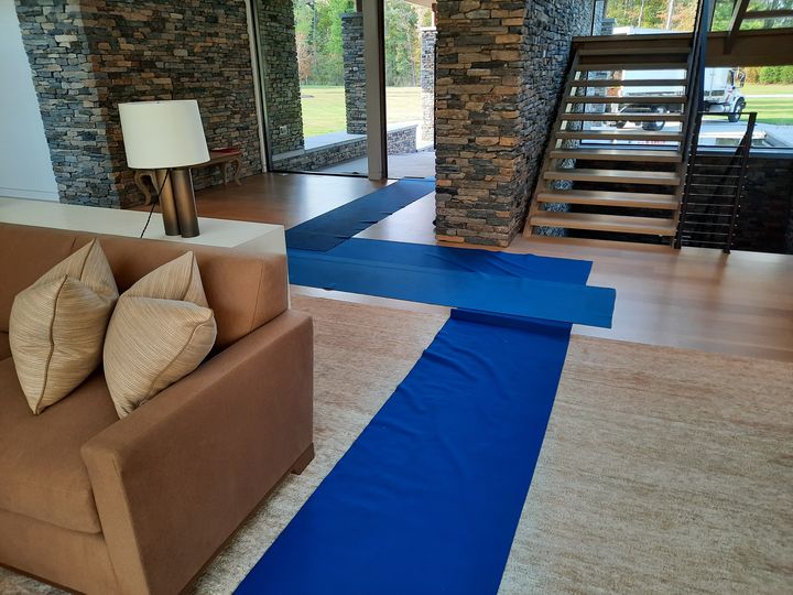 Floor runners protecting a living room floor (Full Service Moving) by Affordable Moving Solutions of Ohio