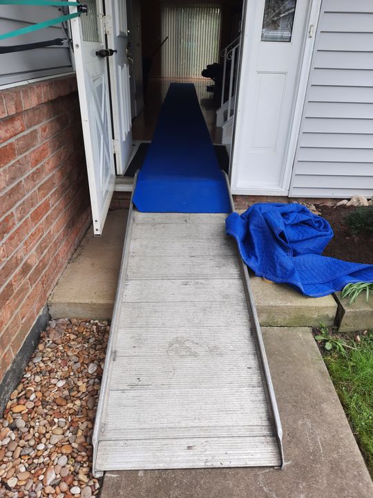 Ramp and floor runner set up at a home entrance (Full Service Moving) by Affordable Moving Solutions of Ohio