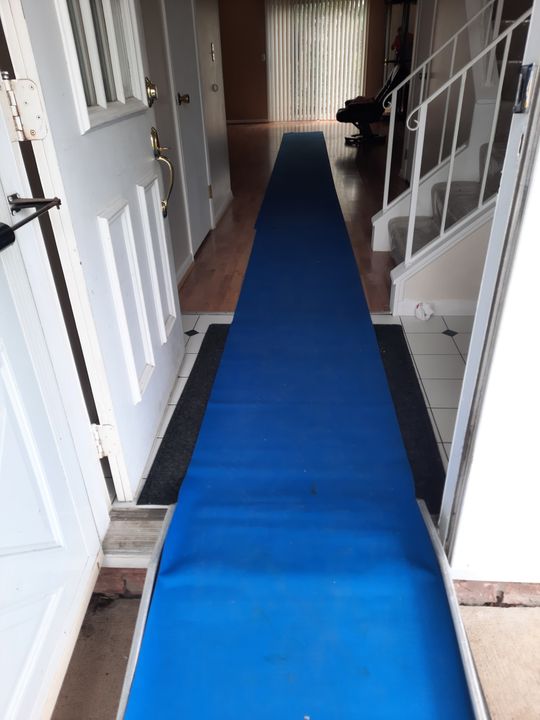 Floor runner protecting an entryway (Full Service Moving) by Affordable Moving Solutions of Ohio