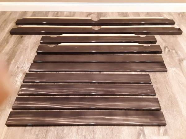 Pool table rails laid out during disassembly (Pool Table Moving Services) by Affordable Moving Solutions of Ohio